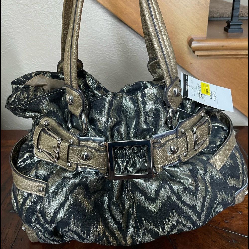 NWT Wilson’s Leather purse.